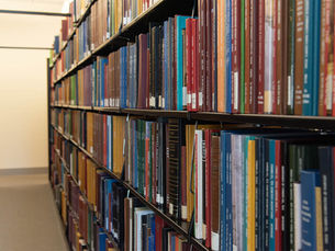 Genealogy books on a shelf